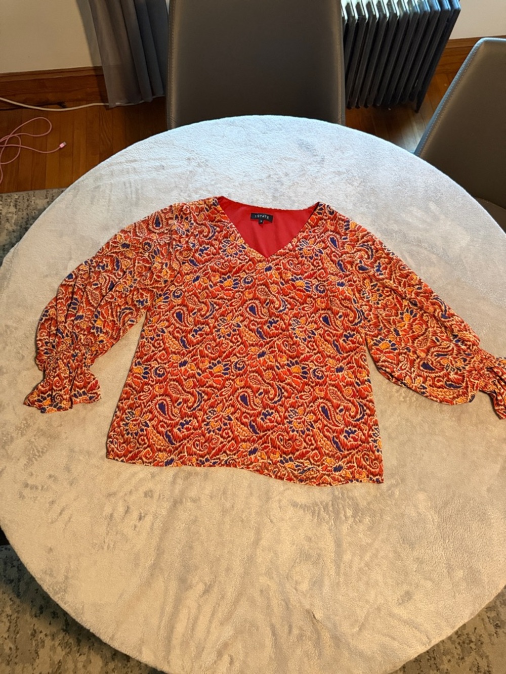 1. State Orange Paisley V-Neck Blouse